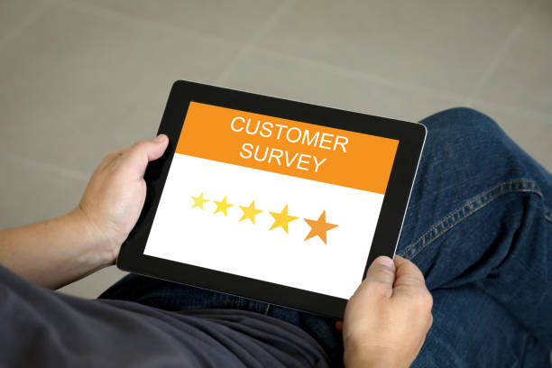 istock Customer satisfaction survey tablet star rating 1216928413