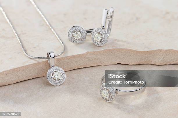Elegant Jewelry Set Of White Gold Ring Necklace And Earrings With Diamonds Stock Photo - Download Image Now