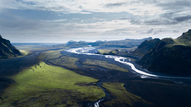 istock spray and waterfall in iceland 1216930851