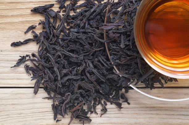 istock Cup of tea with dried large leaves 1216930872
