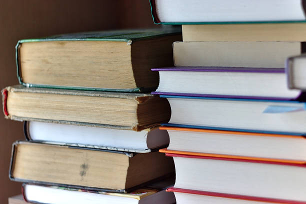 istock books are stacked on the bookshelf 1216931870