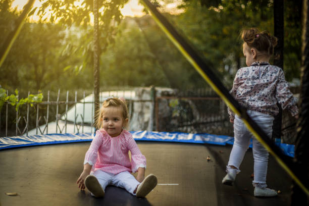 istock Kids have fun on the trampoline 1216931933