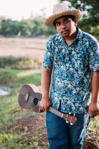 istock southeast asian ukulele musician 1216932008