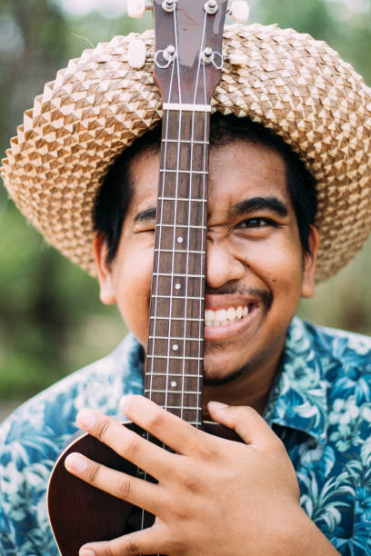 istock southeast asian ukulele musician 1216932092