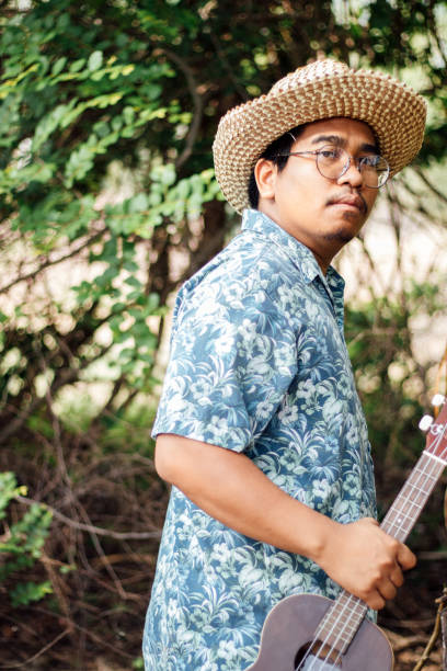istock southeast asian ukulele musician 1216932093