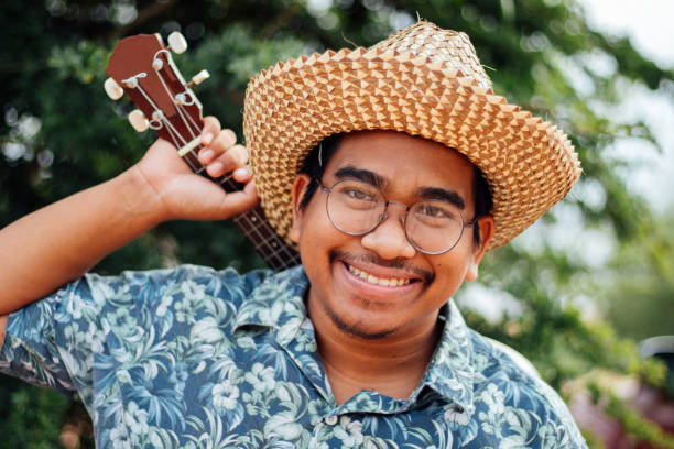 istock southeast asian ukulele musician 1216932102