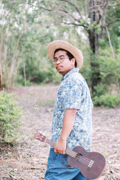 istock southeast asian ukulele musician 1216933697