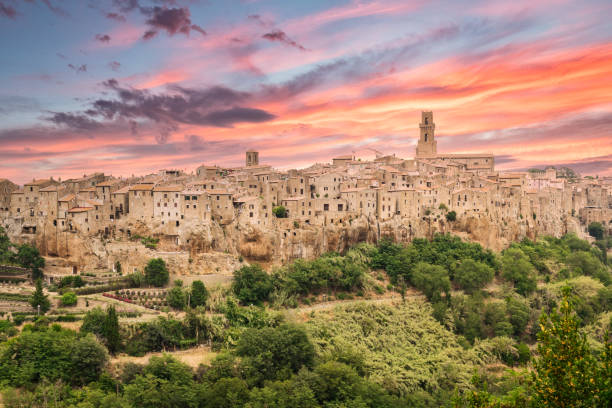 Pitigliano, a town built on a tuff rock, is one of the most beautiful villages in Italy. Panorama of Pitigliano, a town built on a tuff rock, is one of the most beautiful villages in Italy. pitigliano stock pictures, royalty-free photos & images