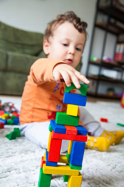 istock Baby play with toy 1216936517