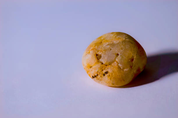 a sharp shot  of a stone with a blurred simple background