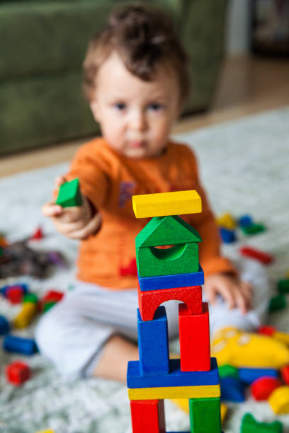 istock Baby play with toy 1216936561