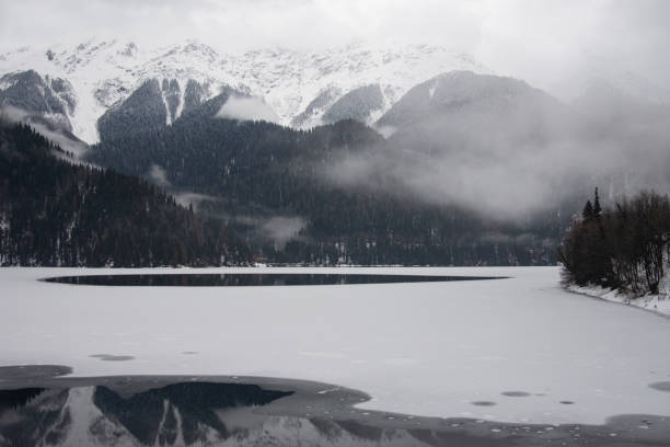 istock Winter, vacation and evening in the mountains. 1216940411