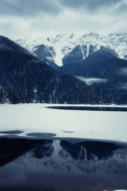 istock Winter, vacation and evening in the mountains. 1216940670