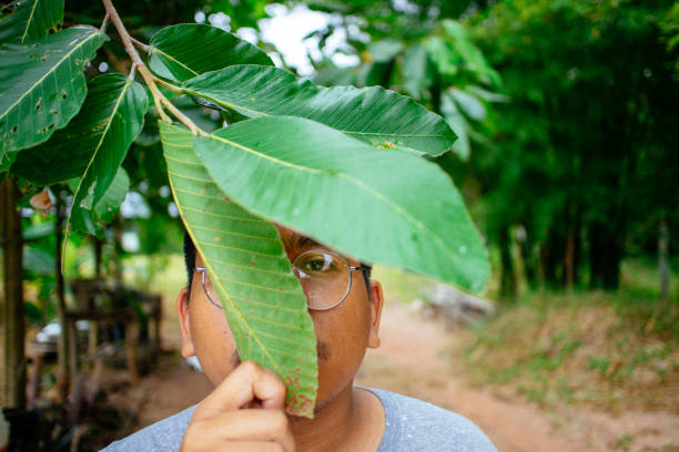 istock southeast asian man relaxing with nature 1216941625