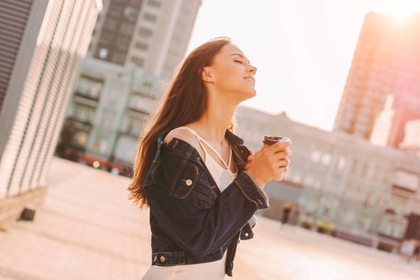 istock Enjoying morning coffee on sunny street 1216941626