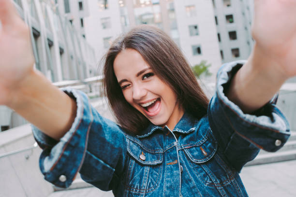 istock Having fun and making selfie on city streets 1216942074