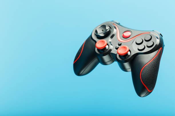 istock Black gamepad on a black red background, . Gaming concept. 1216944906