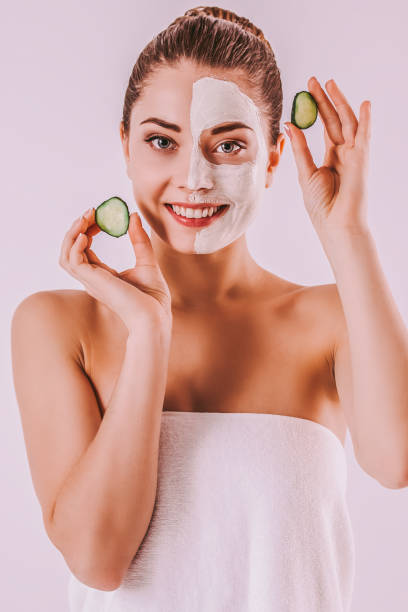 istock Beauty model with facial mask isolated 1216944983