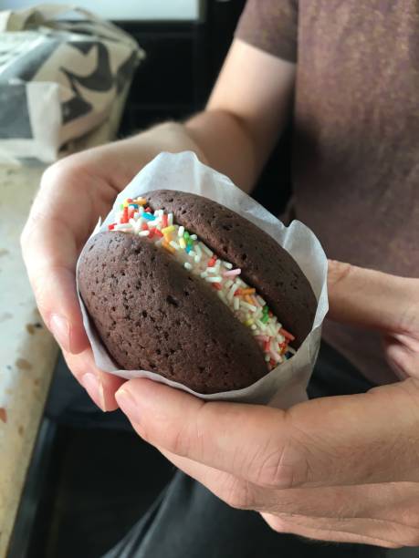 istock Person holding a whoopie pie 1216945049