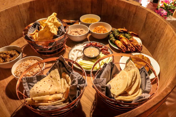 istock Traditional Maldivian Beach Dinner served in a Malafaai barrel 1216946152