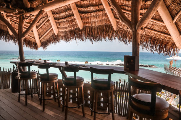 istock Tropical driftwood Restaurant by the beach 1216950556
