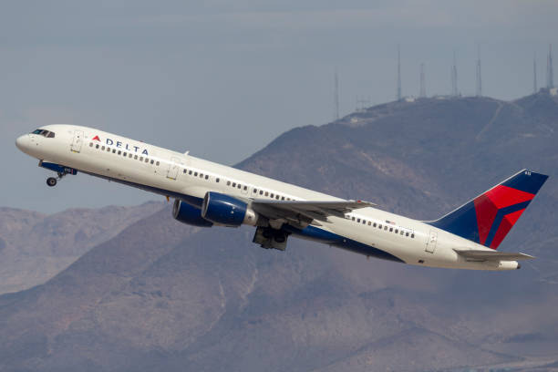 Delta Air Lines Boeing 757 large commercial airliner aircraft departing McCarran International Airport in Las Vegas. Las Vegas, Nevada, USA - May 8, 2013: Delta Air Lines Boeing 757 large commercial airliner aircraft departing McCarran International Airport in Las Vegas. boeing 757 stock pictures, royalty-free photos & images