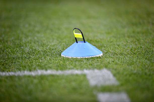 istock Soccer training marker cones are seen on a soccer field 1216951977