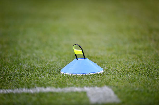 istock Soccer training marker cones are seen on a soccer field 1216951987