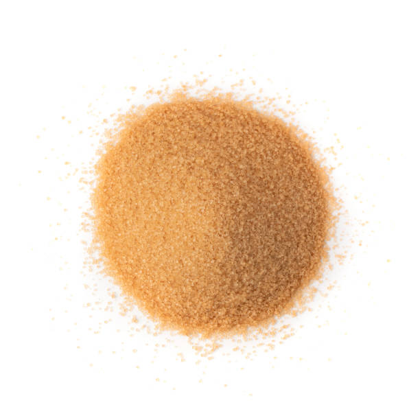 istock Raw Brown Cane Sugar Isolated on White Background 1216952591