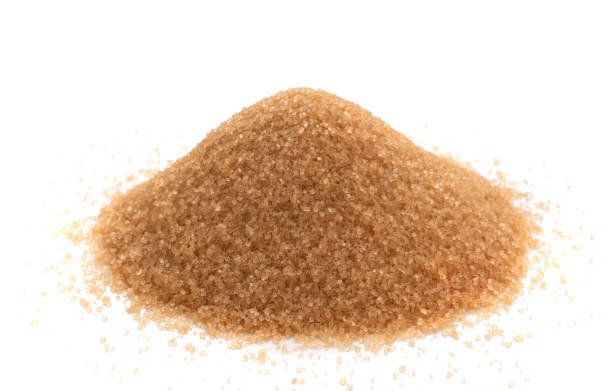 istock Raw Brown Cane Sugar Isolated on White Background 1216952612