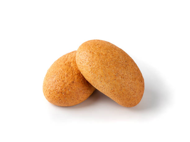 istock Two Round Brown Buns Isolated on White Background 1216952616