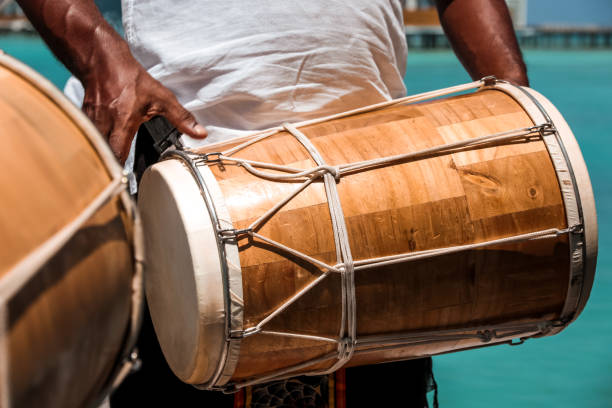 istock Maldivian Bodu Beru Drums played by the sea 1216952736