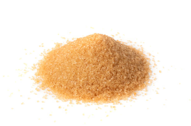 istock Raw Brown Cane Sugar Isolated on White Background 1216953530