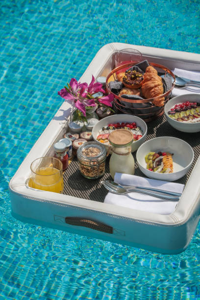 istock Luxurious Floating Breakfast tray in Swimming Pool 1216953913