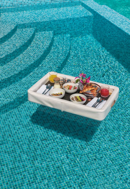 istock Luxurious Floating Breakfast tray in Swimming Pool 1216955010