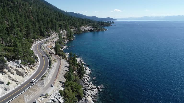 Following cars driving along road at Lake Tahoe