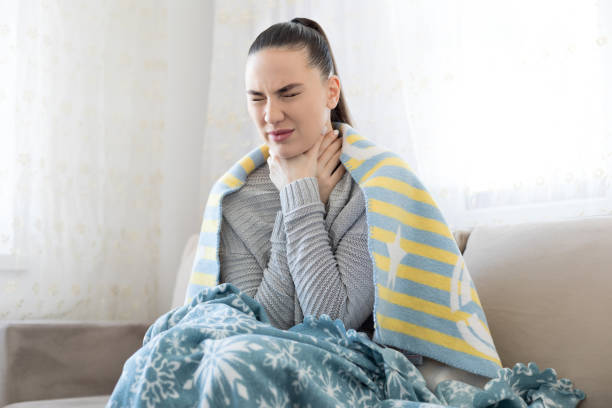 istock Young sick woman at home 1216957055