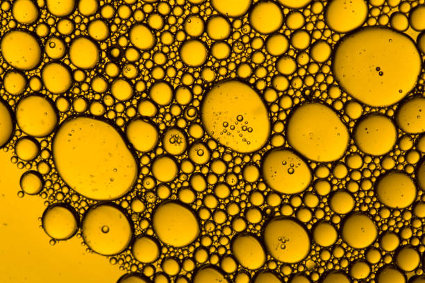 istock Abstract Yellow water bubbles background.   bubbles close up . 1216957930
