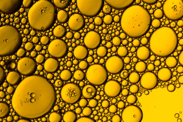 istock Abstract Yellow water bubbles background.   bubbles close up . Macro shot 1216958036