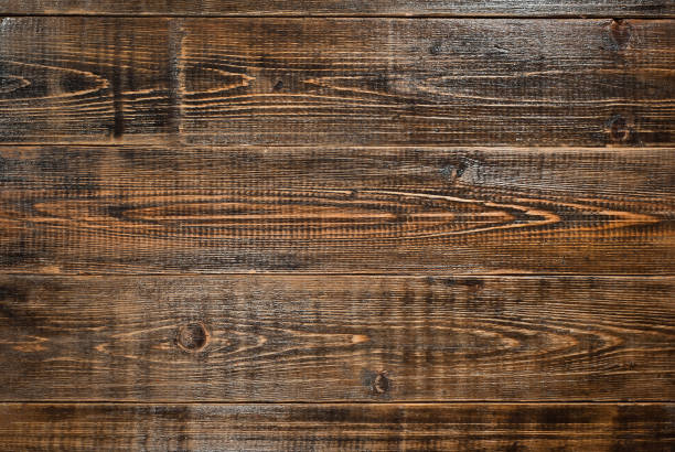 istock Texture of old board. Wooden scratched and dirty surface. 1216959621