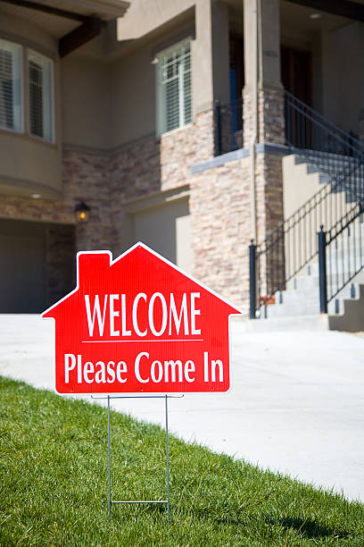 istock WELCOME sign in front of home 121696036