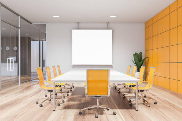 istock Yellow and white meeting room with mock up screen 1216960835