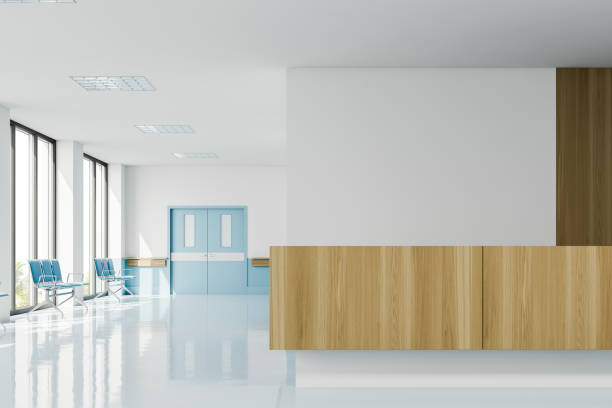 istock Comfortable wooden reception desk in hospital 1216961277