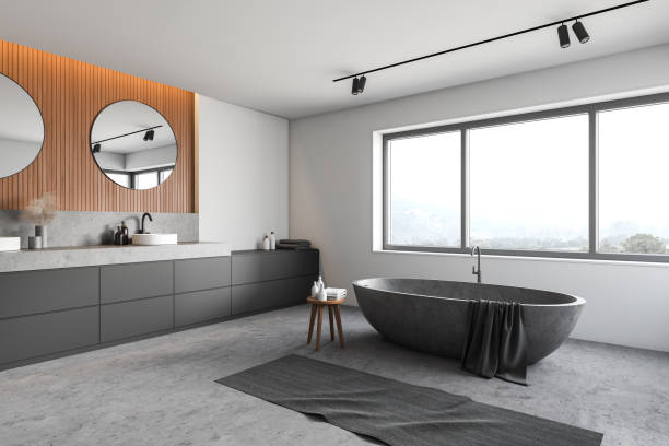 istock White and wooden bathroom corner with stone tub 1216961415