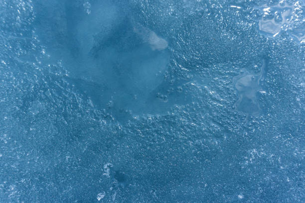 istock texture of ice on a winter lake in spring. pure ice 1216964397