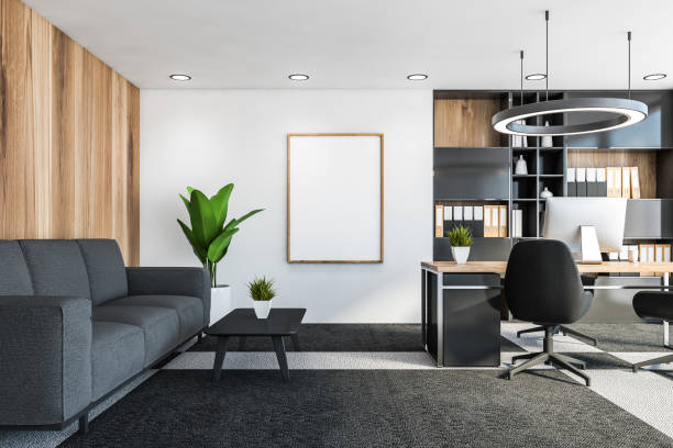 istock White and wood CEO office with vertical poster 1216964753