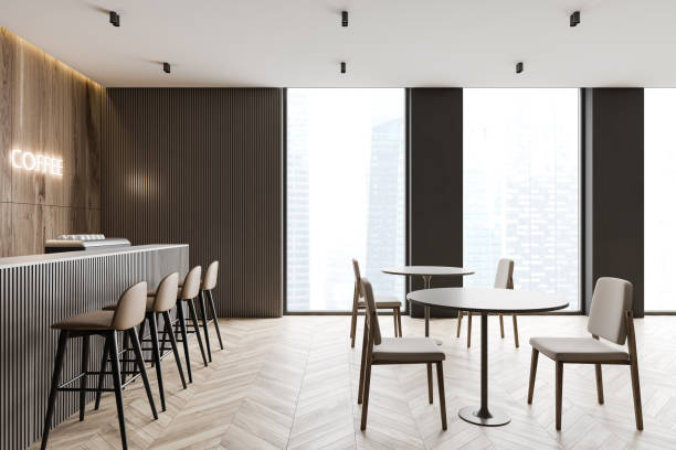istock Modern coffee shop interior with bar and tables 1216965119