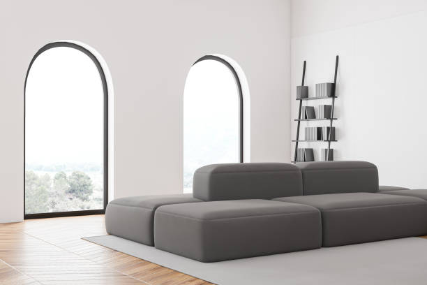 istock Arched window living room corner with sofa 1216966136