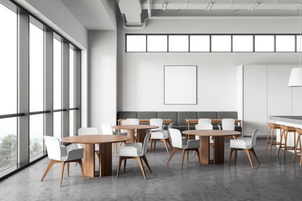 White restaurant interior with poster Interior of stylish industrial style restaurant with white walls, concrete floor, round tables with chairs and sofa and vertical mock up poster frame. 3d rendering cafeteria stock pictures, royalty-free photos & images