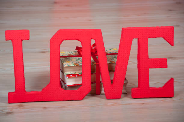 istock Big white letters. Lettering Love. Close up. 1216966415